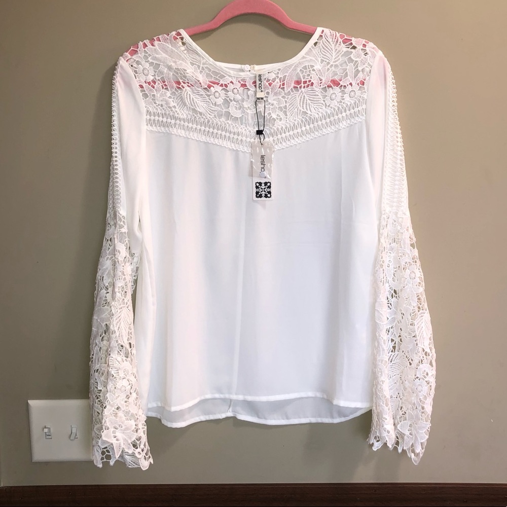 White blouse with lace sleeves